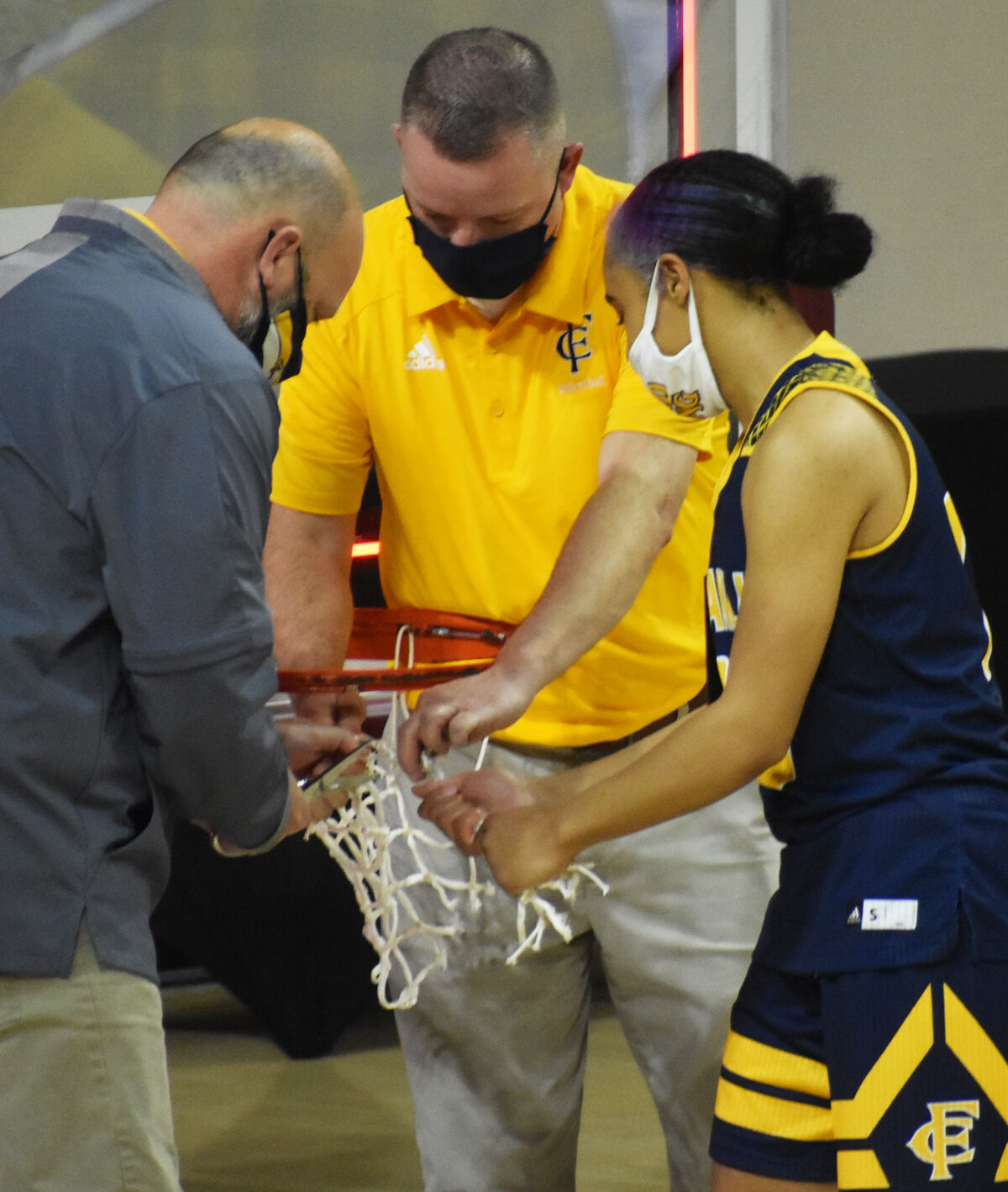 Miles cutting down net.jpg